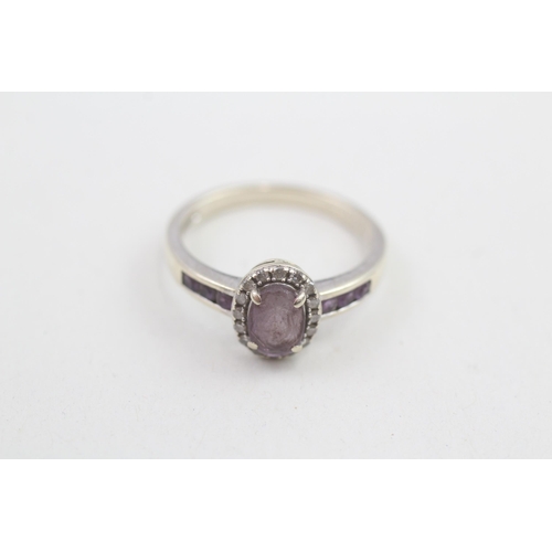 148 - 9ct gold diamond & amethyst oval halo ring with amethyst set shoulders 2.5g Size O