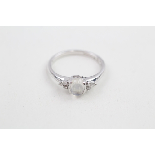 153 - 9ct white gold diamond & moonstone trefoil ring 2.3g Size P