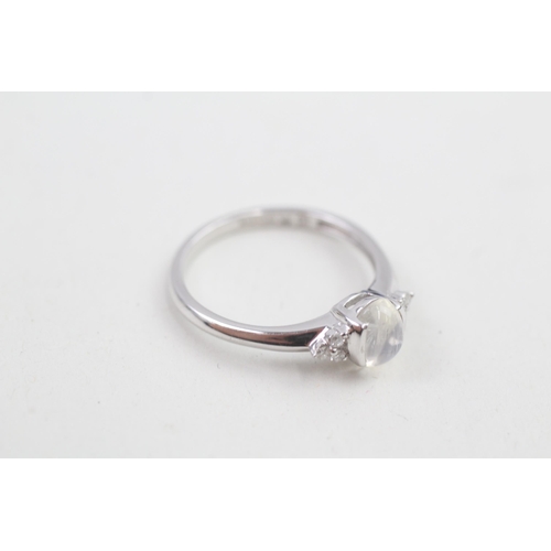 153 - 9ct white gold diamond & moonstone trefoil ring 2.3g Size P