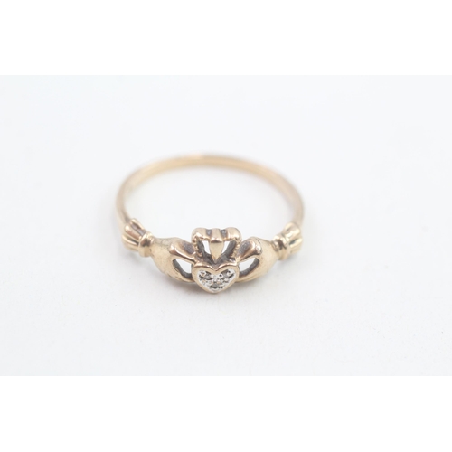 162 - 9ct gold diamond claddagh ring 1.8g Size P