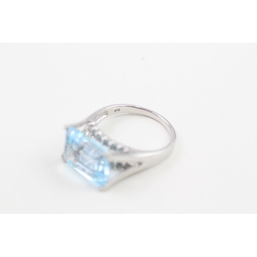 179 - 9ct white gold topaz dress ring 6.1g Size R