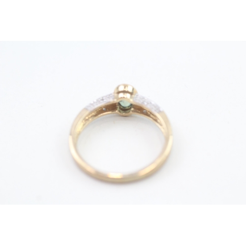 191 - 10ct gold chrysoberyl single stone ring with diamond set shoulders 2.4g Size N