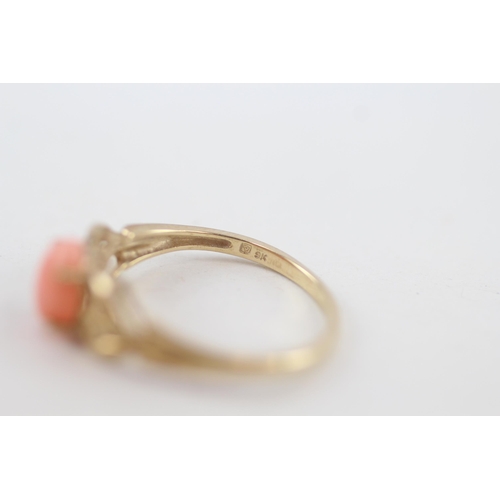 207 - 9ct gold pink coral single stone ring with openwork shank 2.3g Size S