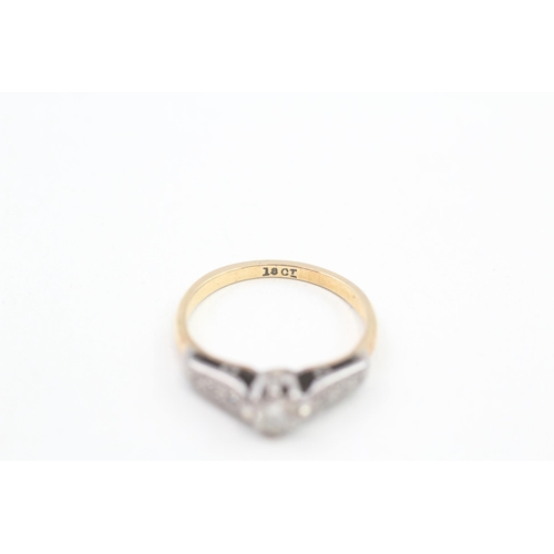 219 - 18ct gold round brilliant diamond single stone ring with diamond set shoulders 2.4g Size L