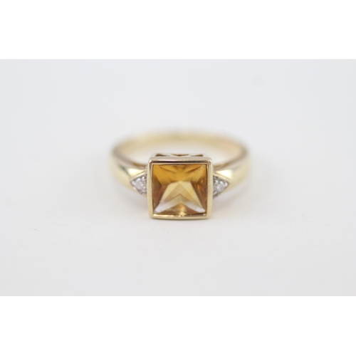 220 - 9ct gold citrine single stone ring with diamond sides 3g Size O