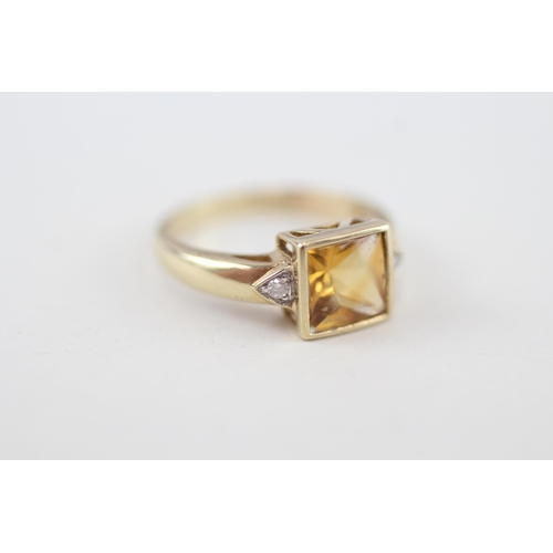 220 - 9ct gold citrine single stone ring with diamond sides 3g Size O