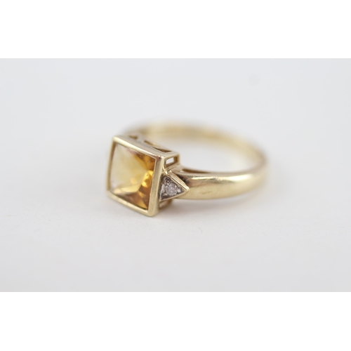 220 - 9ct gold citrine single stone ring with diamond sides 3g Size O