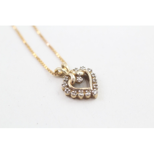 223 - 9ct gold diamond heart shaped pendant necklace, claw set 3g