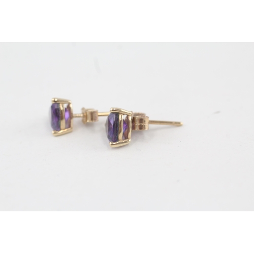 229 - 9ct gold trillion amethyst stud earrings with scroll backs 1g