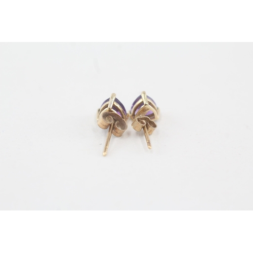 229 - 9ct gold trillion amethyst stud earrings with scroll backs 1g