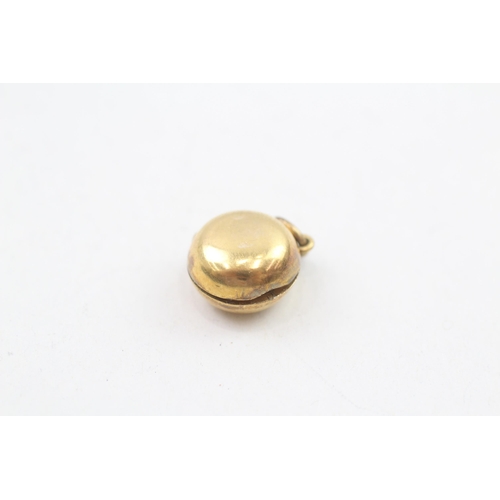 238 - 9ct gold antique locket charm 1.3g