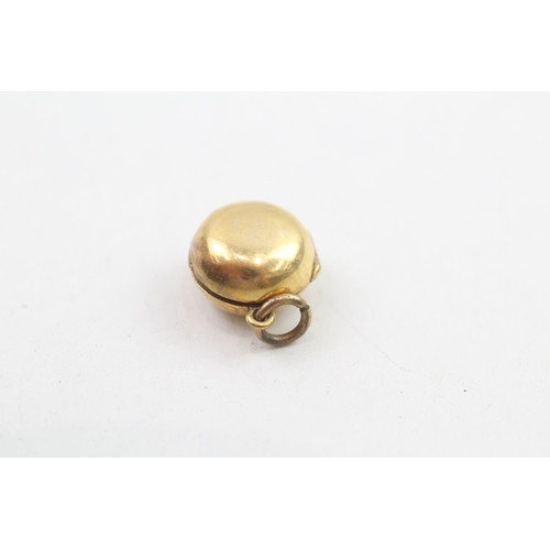 238 - 9ct gold antique locket charm 1.3g