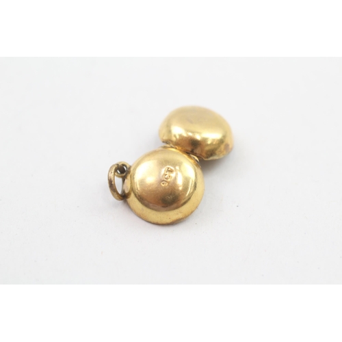 238 - 9ct gold antique locket charm 1.3g