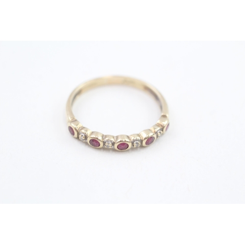 244 - 9ct gold diamond & ruby nine stone ring 1.7g Size Q