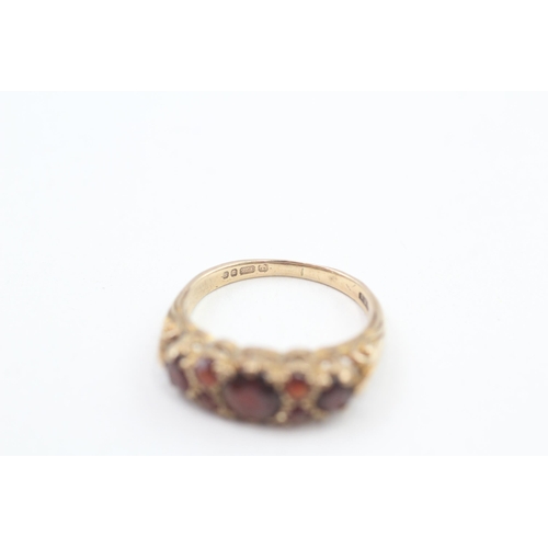 245 - 9ct gold vintage garnet seven stone ring 2.8g Size N