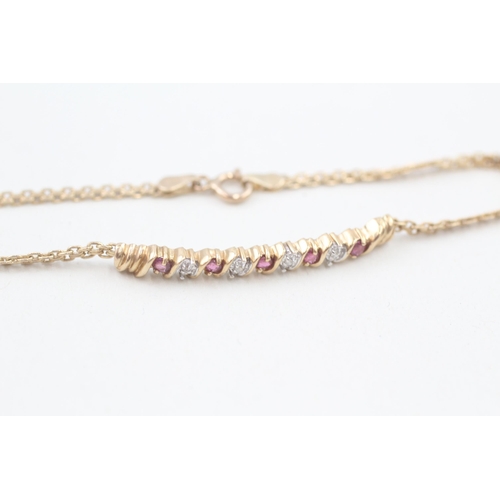 251 - 10ct gold diamond & ruby fancy link bracelet 3.4g