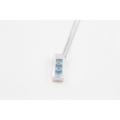 253 - 9ct white gold topaz three stone bar pendant necklace 2g