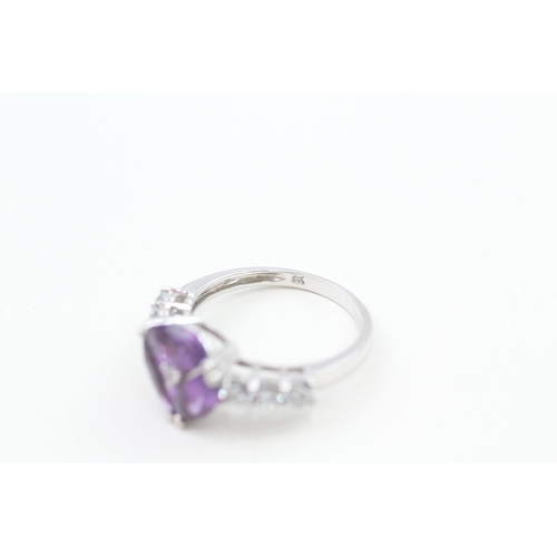 258 - 9ct white gold amethyst & aquamarine dress ring 3.4g Size O