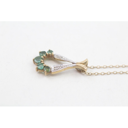 260 - 9ct gold emerald and diamond pendant with 9ct gold chain 2.2g