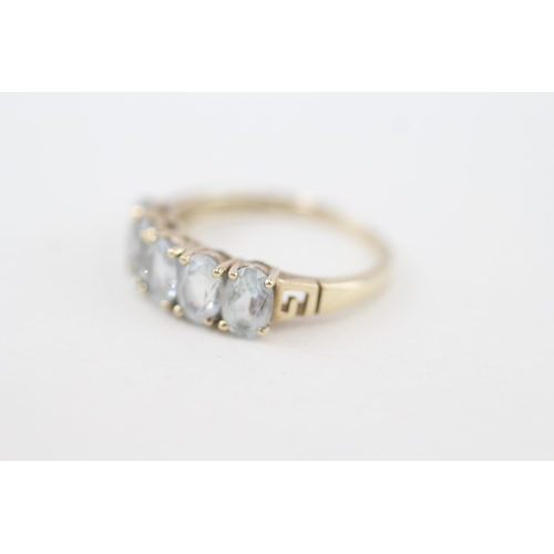 274 - 9ct gold oval cut aquamarine half eternity ring 2.6g Size Q