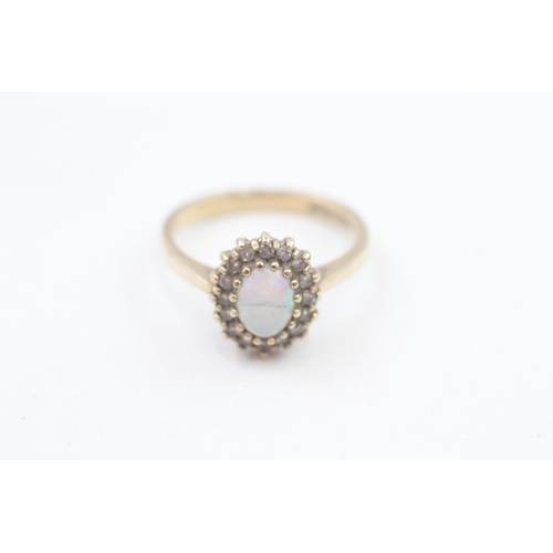 277 - 9ct gold diamond & opal oval cluster ring - as seen, crack to opal 3g Size N