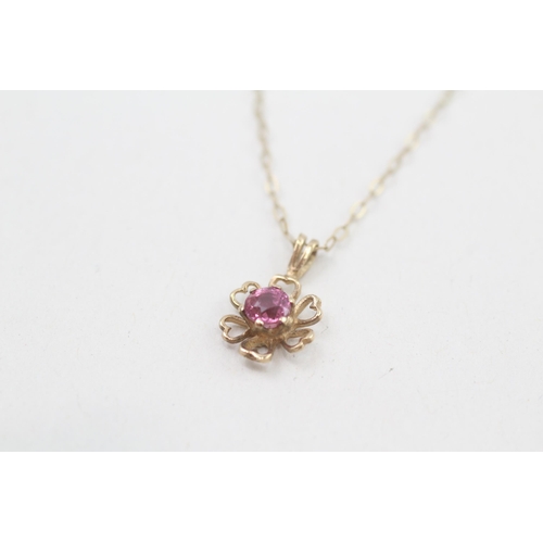 282 - 9ct gold pink sapphire solitaire pendant with 9ct gold chain 0.8g