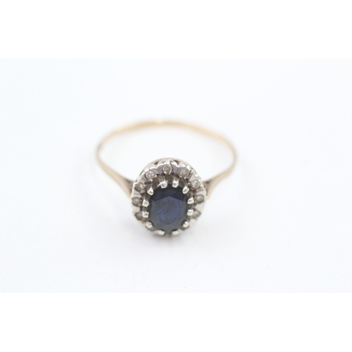 287 - 9ct gold diamond & sapphire oval cluster ring 2.6g Size V 1/2