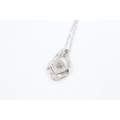 293 - 9ct white gold diamond geometric pendant necklace 2.4g