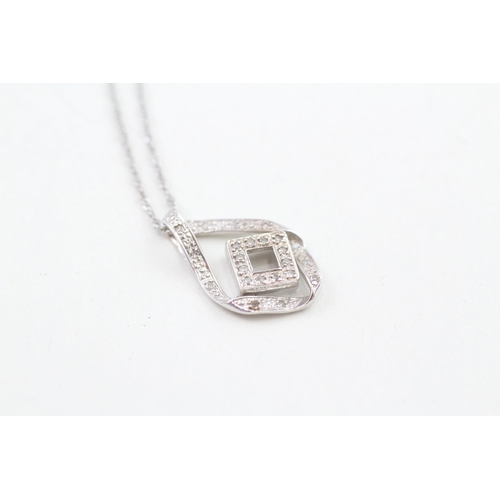 293 - 9ct white gold diamond geometric pendant necklace 2.4g