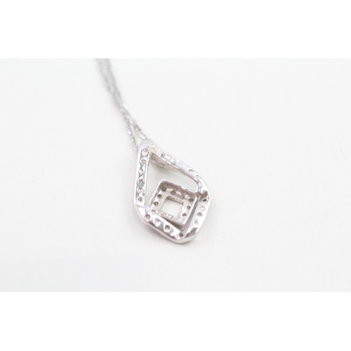 293 - 9ct white gold diamond geometric pendant necklace 2.4g