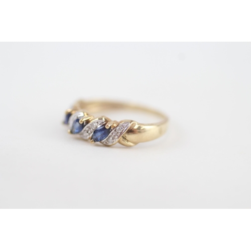 294 - 9ct gold marquise sapphire three stone ring with diamond highlight 1.9g Size P