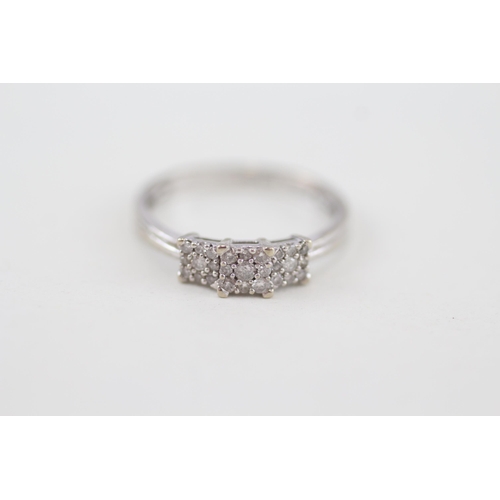 301 - 9ct white gold diamond simulated trilogy dress ring 1.9g Size P