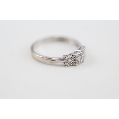 301 - 9ct white gold diamond simulated trilogy dress ring 1.9g Size P