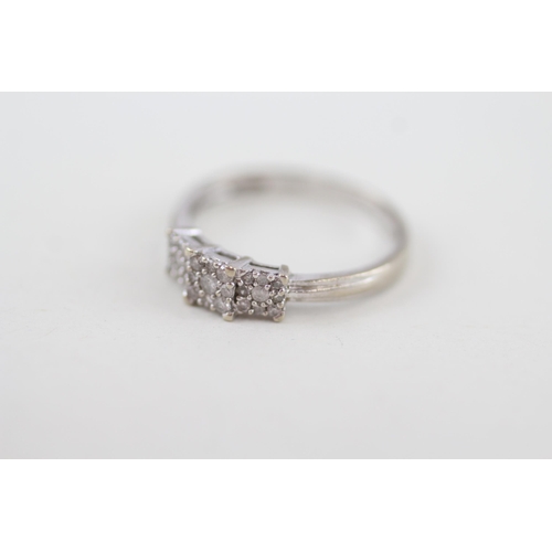 301 - 9ct white gold diamond simulated trilogy dress ring 1.9g Size P