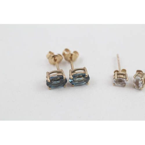 308 - 2x 9ct gold blue topaz stud earrings 2g