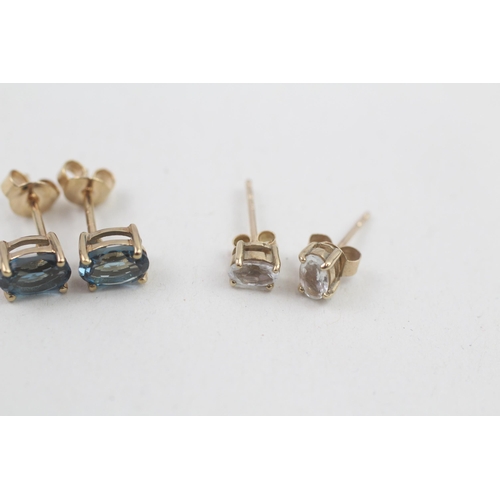 308 - 2x 9ct gold blue topaz stud earrings 2g