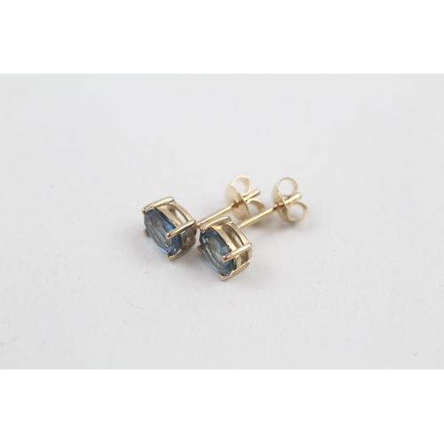 308 - 2x 9ct gold blue topaz stud earrings 2g