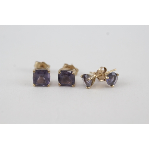 309 - 2x 9ct gold iolite stud earrings 2.1g