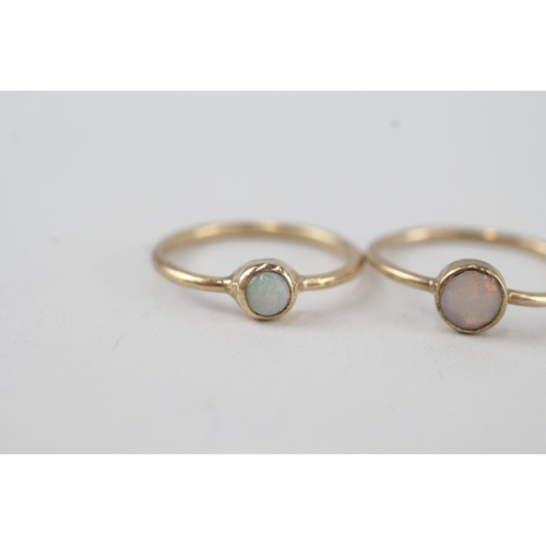 315 - 2x 9ct gold opal solitaire rings, bezel set 2.2g Size N & K