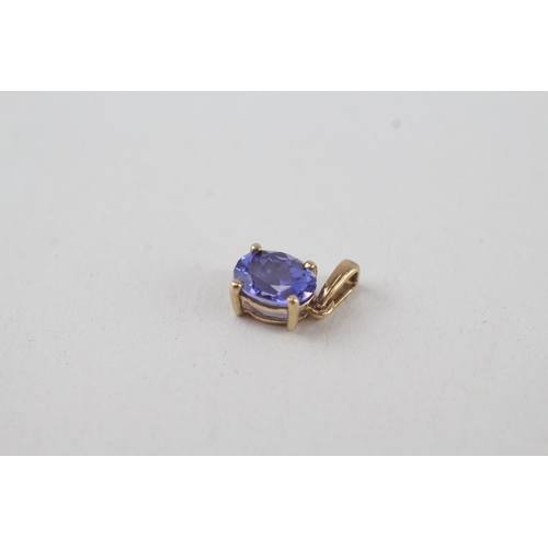 316 - 2x 9ct gold oval cut tanzanite pendant, claw set 1.2g