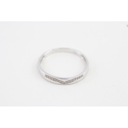 320 - 9ct white gold diamond wishbone set dress ring 1.9g Size V