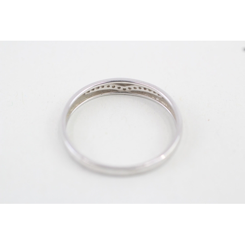 320 - 9ct white gold diamond wishbone set dress ring 1.9g Size V