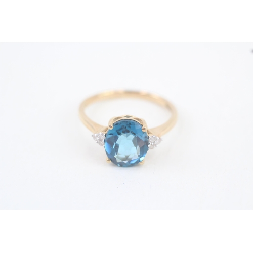 321 - 9ct gold blue topaz and diamond cocktail ring 3.7g Size S 1/2