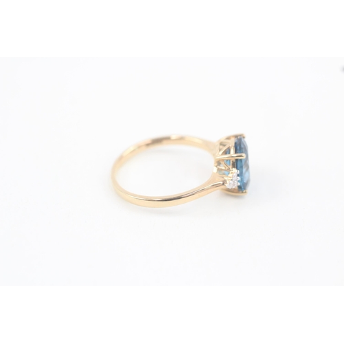 321 - 9ct gold blue topaz and diamond cocktail ring 3.7g Size S 1/2