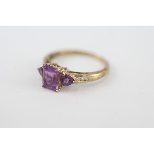 38 - 9ct gold vari-cut amethyst dress ring with diamond shoulders 2.2g Size O