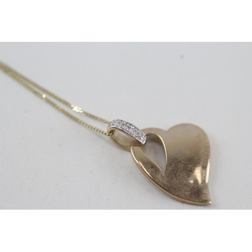 46 - 9ct gold heart shaped pendant & chain with a diamond bail 2.4g