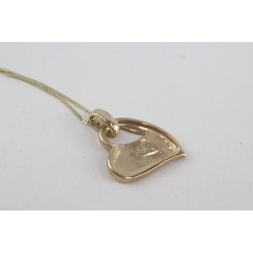 46 - 9ct gold heart shaped pendant & chain with a diamond bail 2.4g