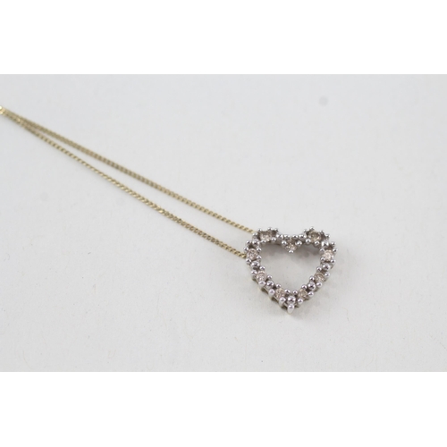 51 - 9ct gold diamond heart shaped pendant necklace, claw set 1.9g