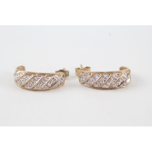 53 - 9ct gold diamond earrings with scroll backs 3g