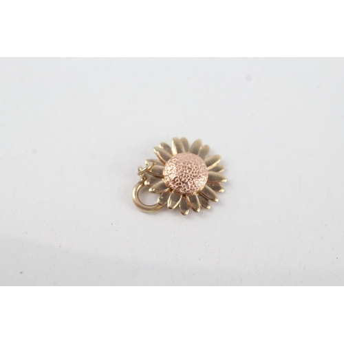 56 - 9ct gold sunflower charm by Clogau 1.1g